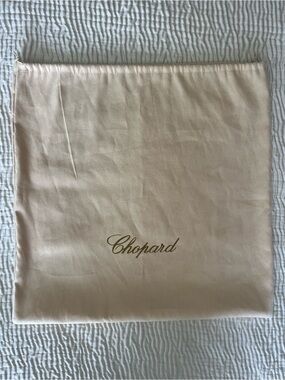 Chopard beige storage dust bag with gold script